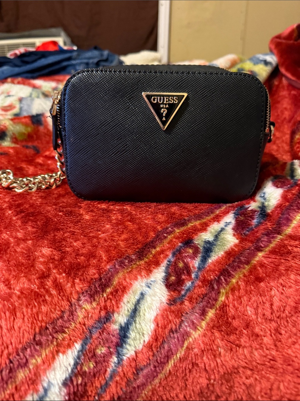 GUESS Black Crossbody Bag with Gold Triangle Logo